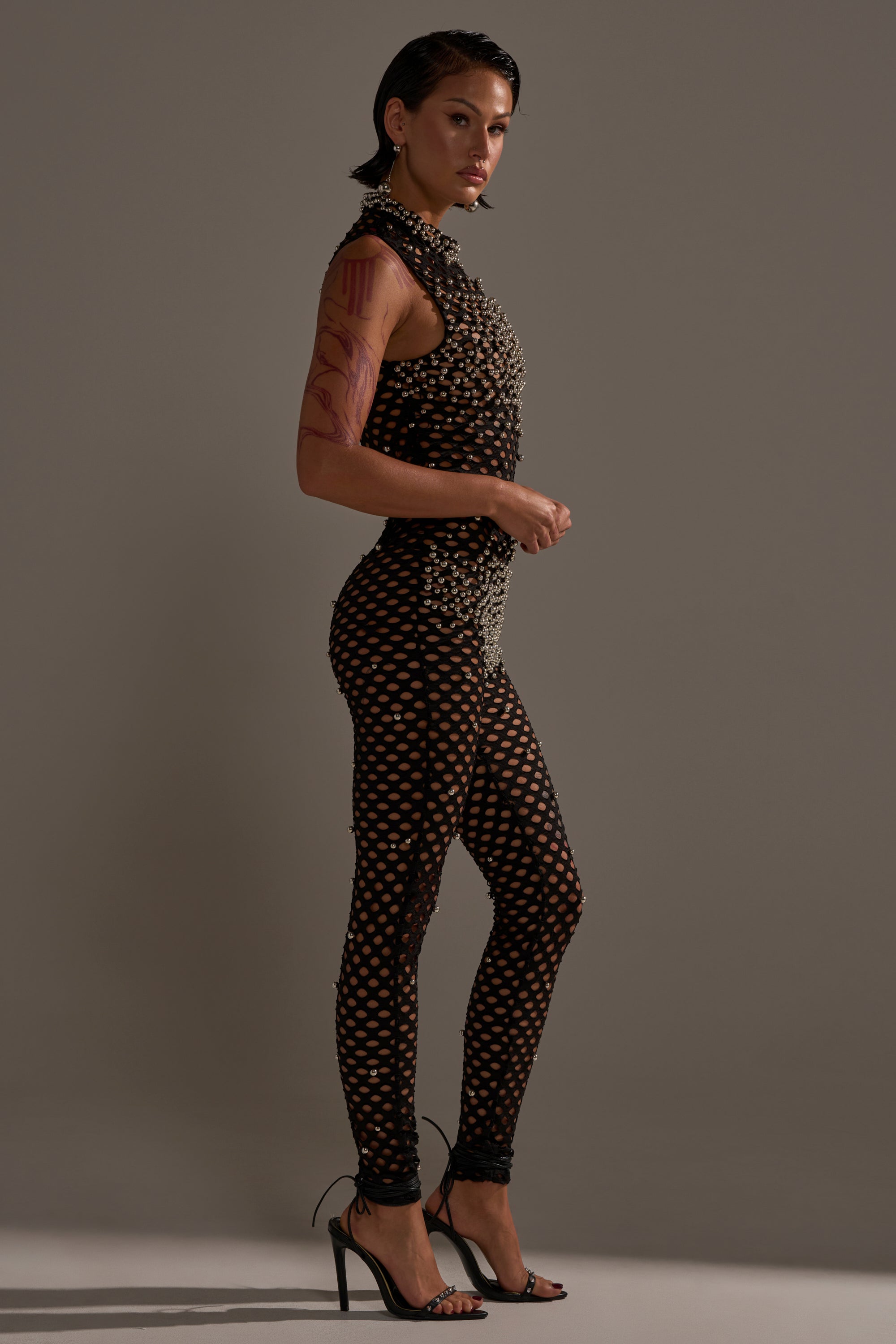 COULD NEVER BE ME BEADED MESH JUMPSUIT